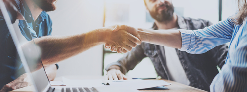Photo by SFIO CRACHO shows people shaking hands on an agreement; licensed from https://www.shutterstock.com/de/image-photo/business-partnership-handshake-concept-two-coworkers-720820906
