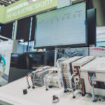 Smart Business Proficloud.io exhibit at Triad Fair showcasing interactive Smart Services experience via smartphone